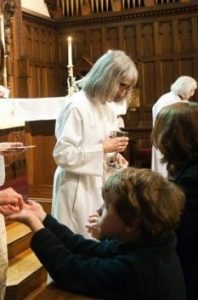 Receiving communion at the altar